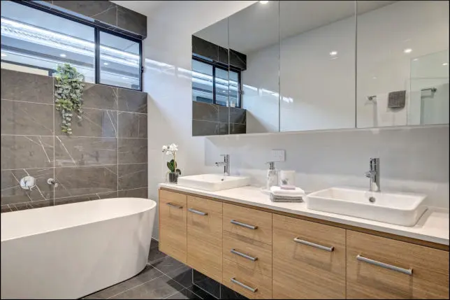 Bathroom with bath mixer and outlet with twin basins and mixer taps: bathroom, bathtub, mixer tap, twin basins, bathroom fixtures, bathroom renovation