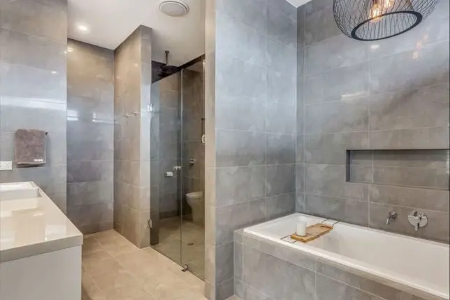 Fully tiled bathroom with inset bath and basin: Inset bath, Bathroom fixtures, Tiled bathroom
