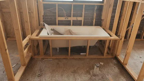 Bath Installation: Bathtub installation, Plumbing installation, Construction site